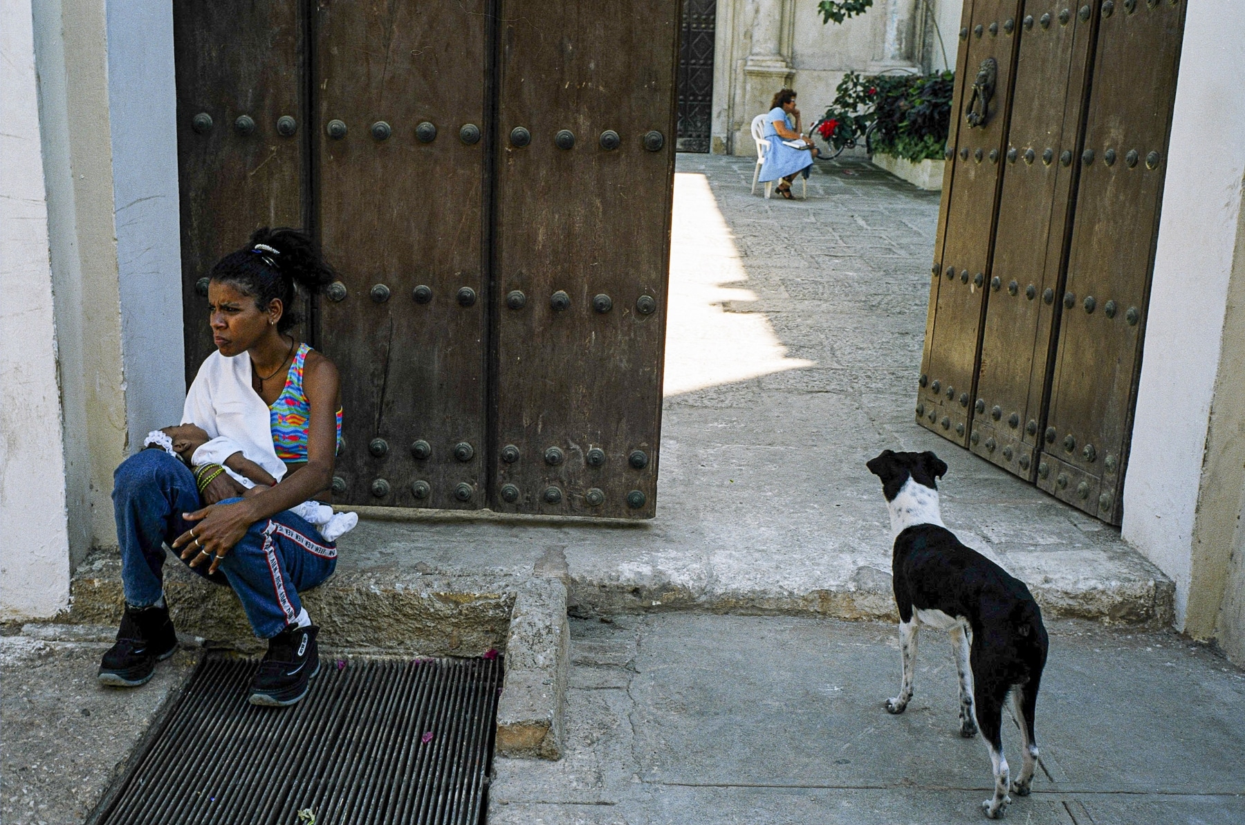 Abandoned Dog and Pregnant Girl at Door of Church