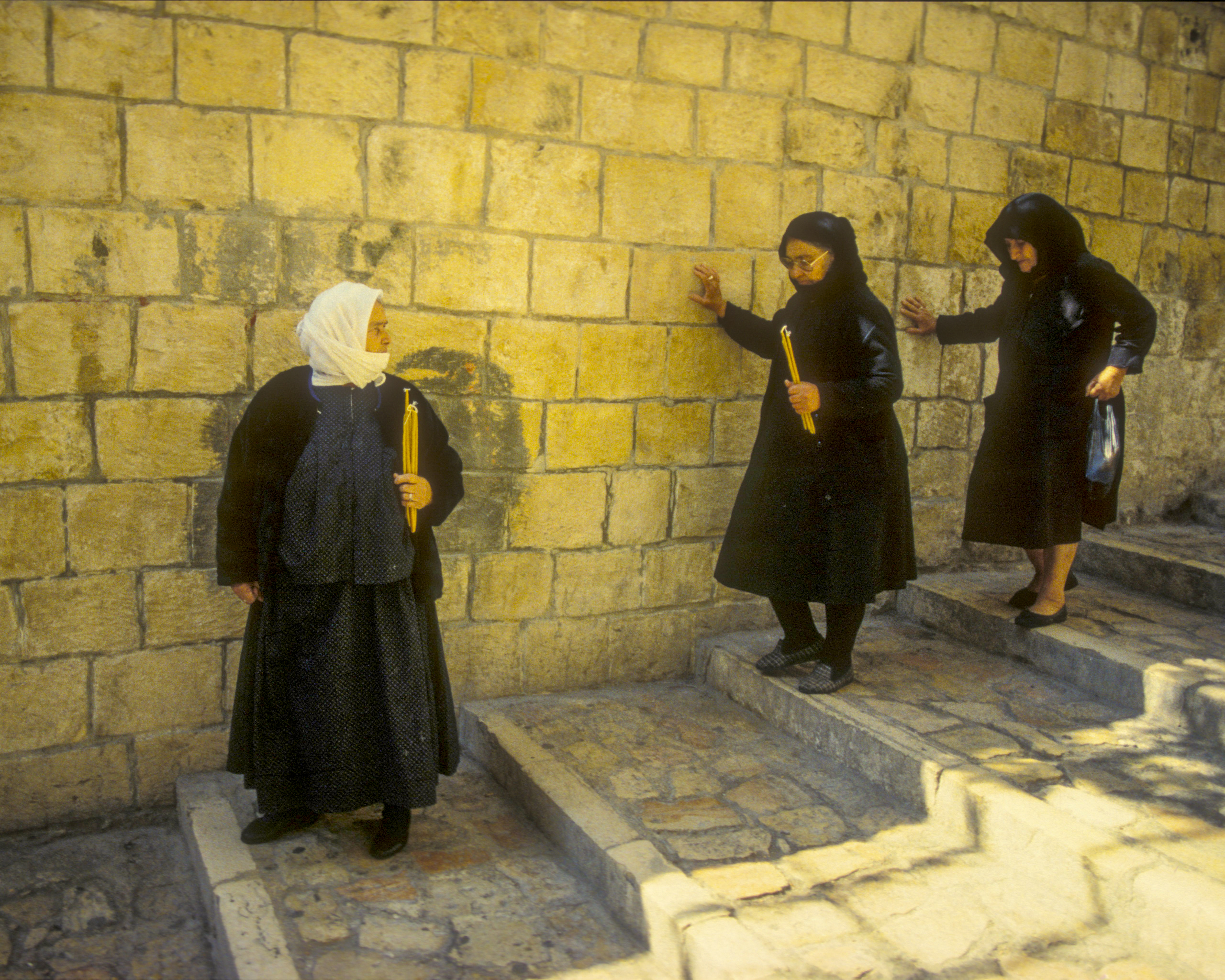 Three women Entering the Muslim Quarter